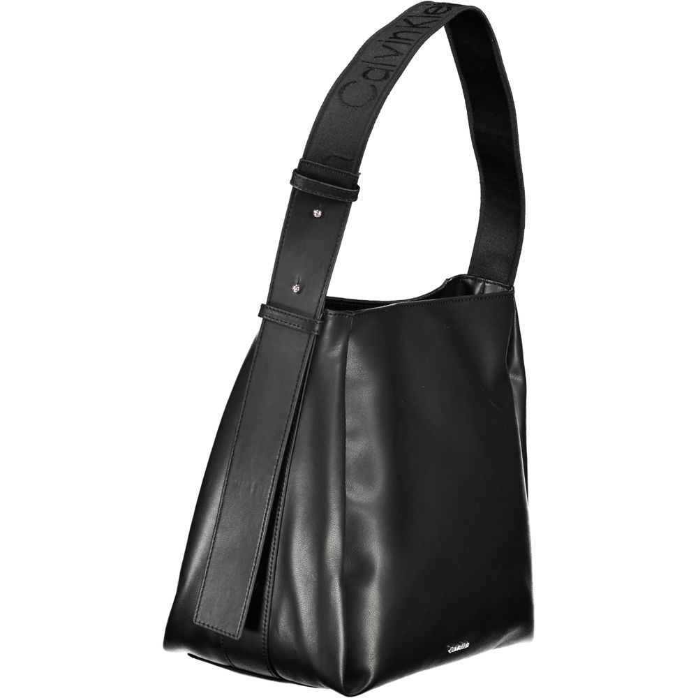 Calvin Klein Black Polyester Handbag with adjustable shoulder handle, multiple compartments, and a stylish logo detail.