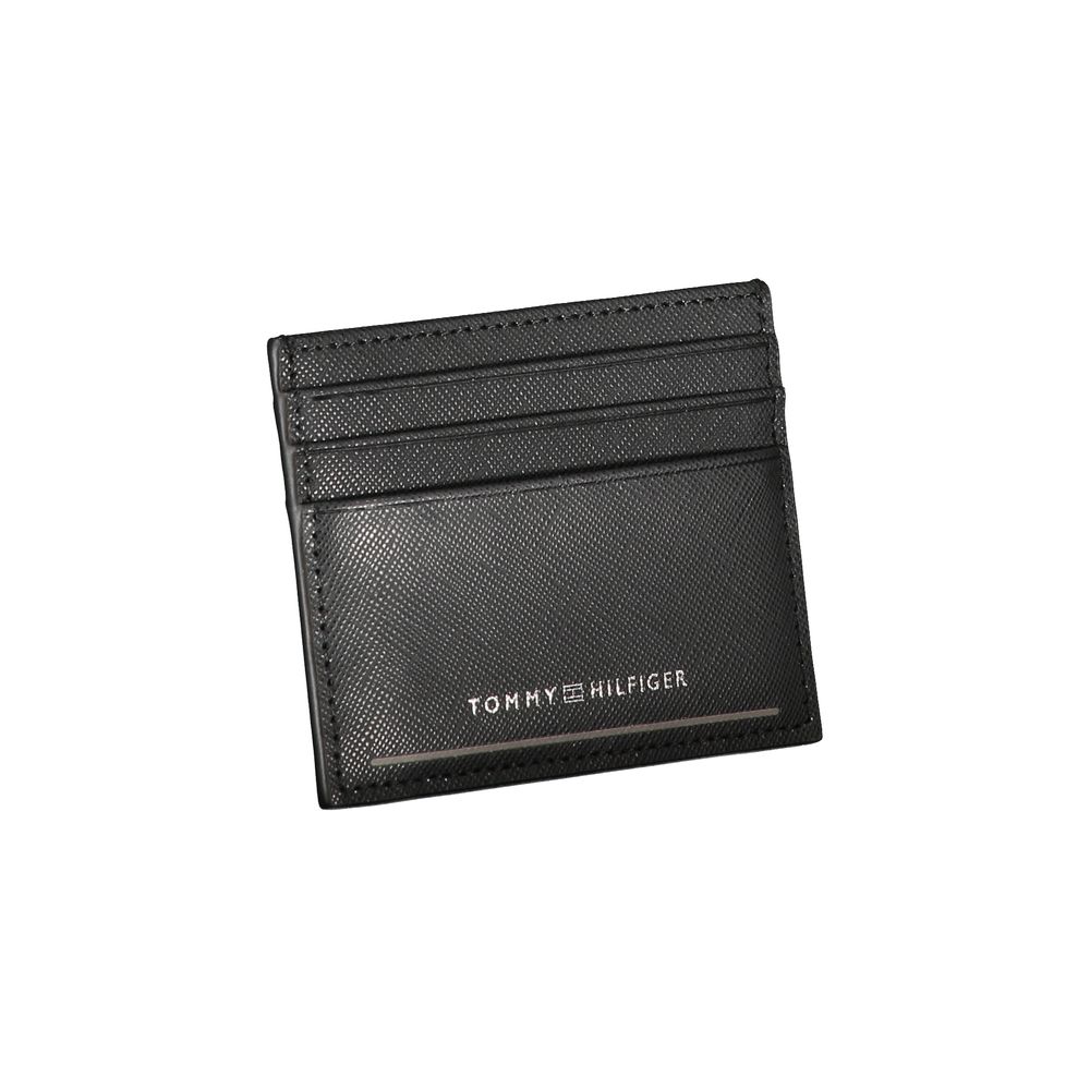 Tommy Hilfiger Black Leather Wallet with card holder, central pocket, contrast details, and logo.