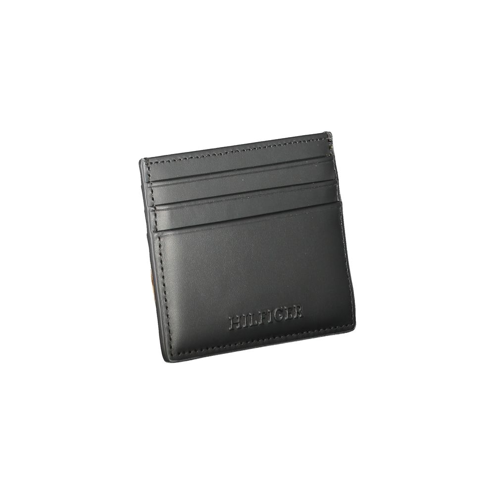 Tommy Hilfiger Black Leather Wallet with card holder, central pocket, card spaces, contrast details, and logo embossing.