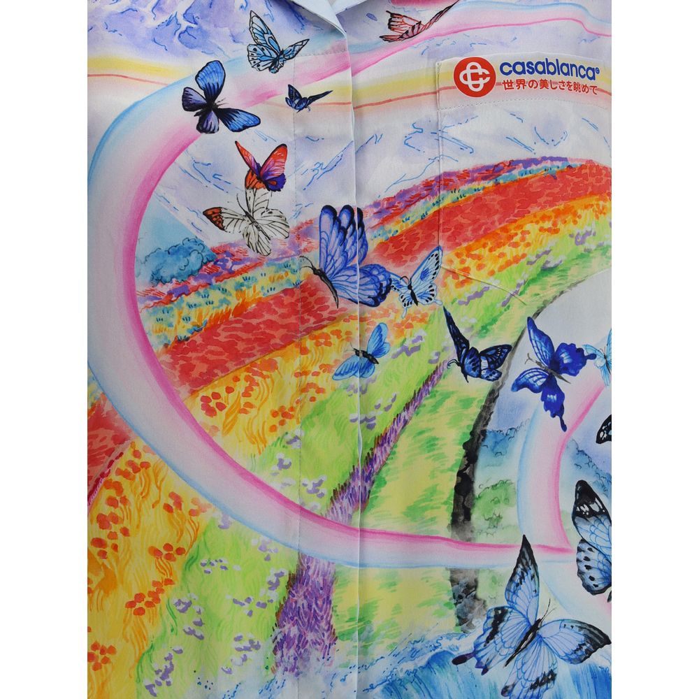 Casablanca Multicolor Silk Pattern Shirt featuring light blue silk with landscape and butterfly print, short sleeves, open collar.