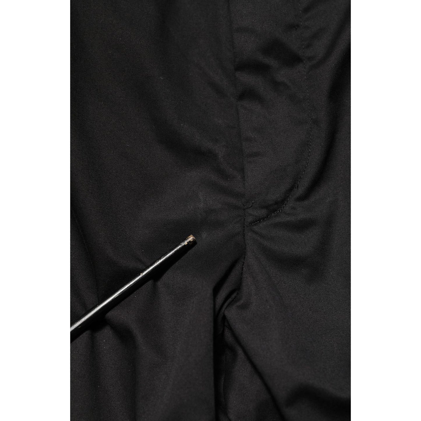 Dolce & Gabbana Black Cotton Tapered Men Formal Trousers Pants with minor fabric defect, showing close-up details.