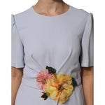 Dolce & Gabbana Light Blue Viscose Blend Floral Applique Dress with short sleeves and round neckline.