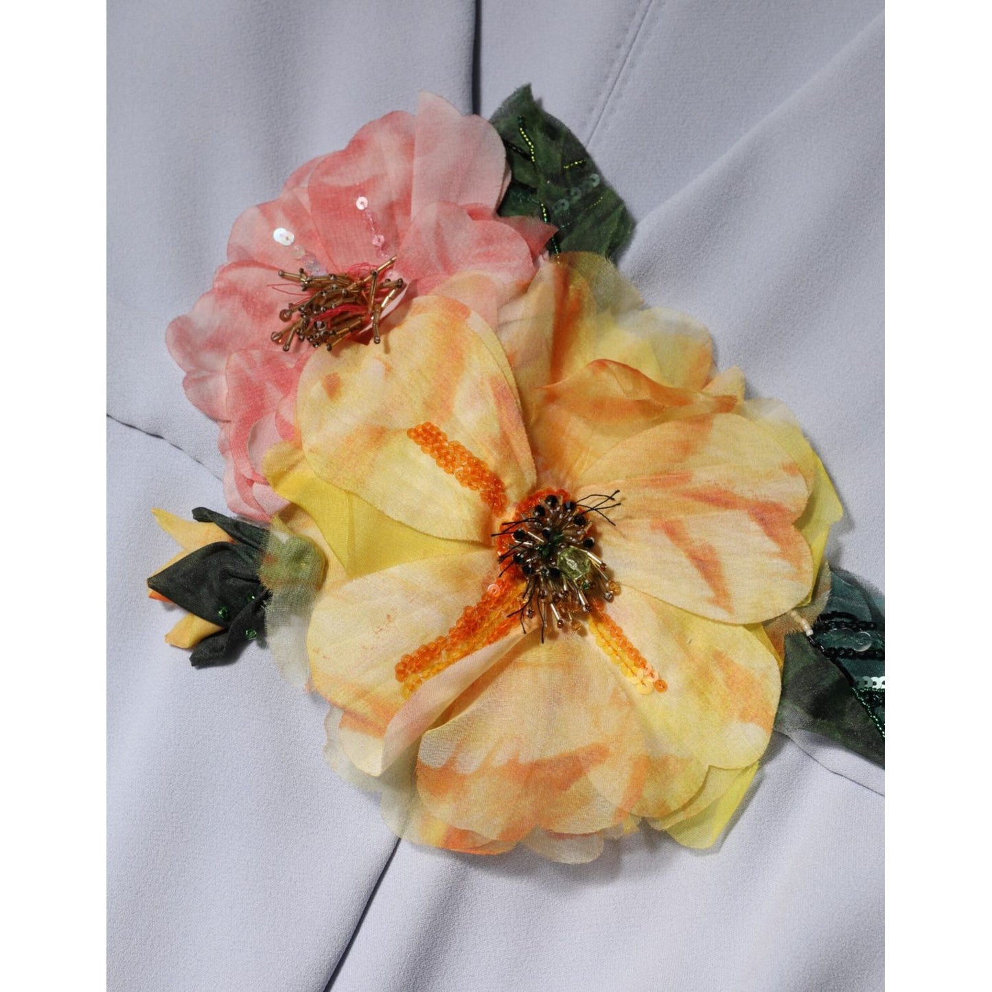 Close-up of floral applique on Dolce & Gabbana Light Blue Viscose Blend Floral Applique Dress.