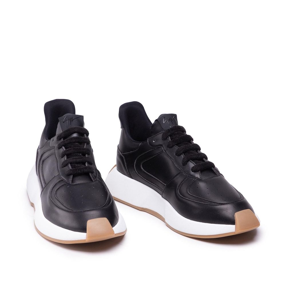 Giuseppe Zanotti Leather Sneakers in black calf leather with round toe and rubber sole, lace-up closure, and logo detail. Made in Italy.