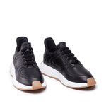 Giuseppe Zanotti Leather Sneakers in black calf leather with round toe and rubber sole, lace-up closure, and logo detail. Made in Italy.