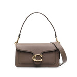 Coach Tabby 26 leather shoulder bag with zip, removable handle, adjustable strap, featuring brown leather and gold clasp.