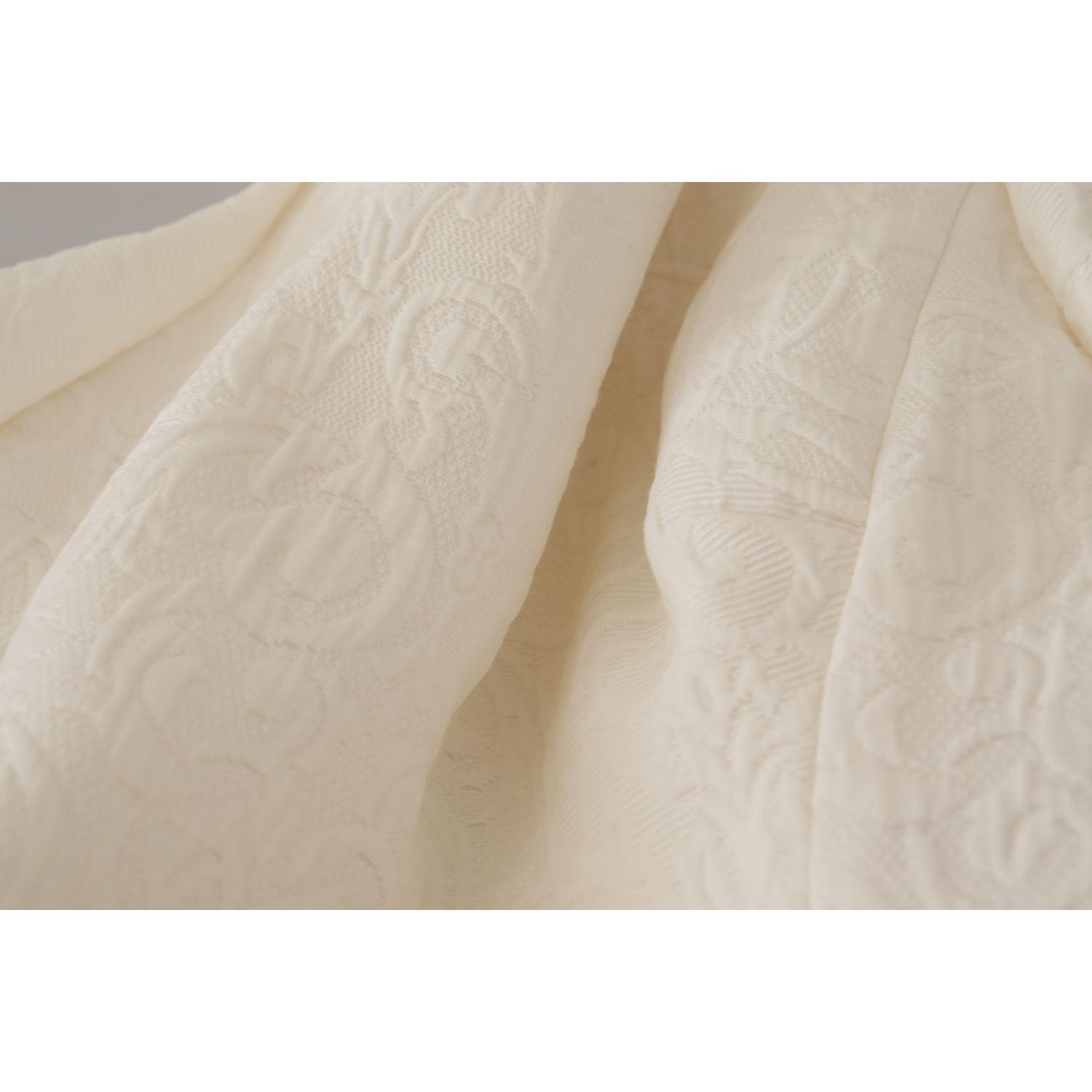 فستان متوسط ​​الطول من دولتشي آند غابانا من الجاكار باللون الأبيض