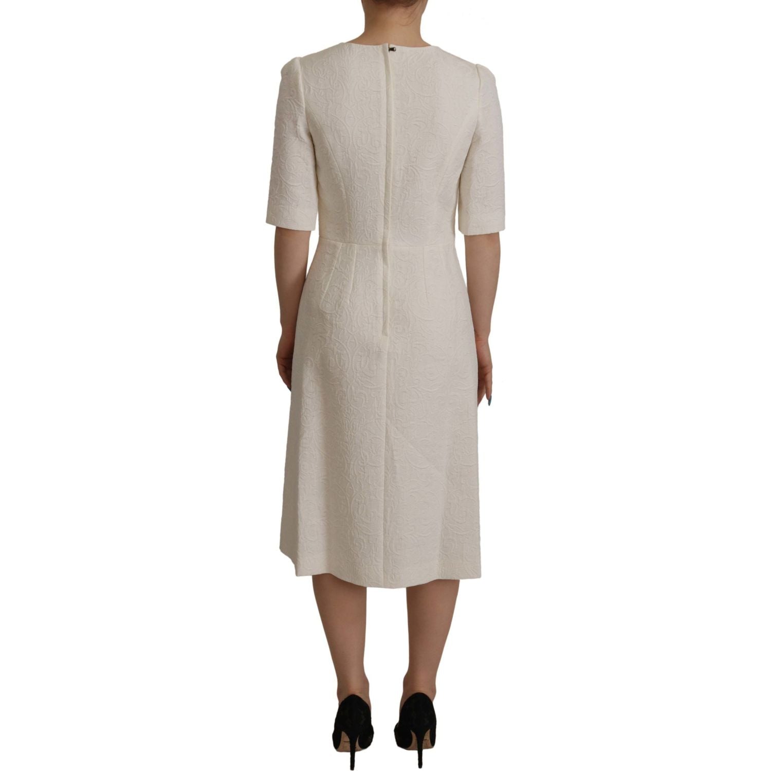 فستان متوسط ​​الطول من دولتشي آند غابانا من الجاكار باللون الأبيض