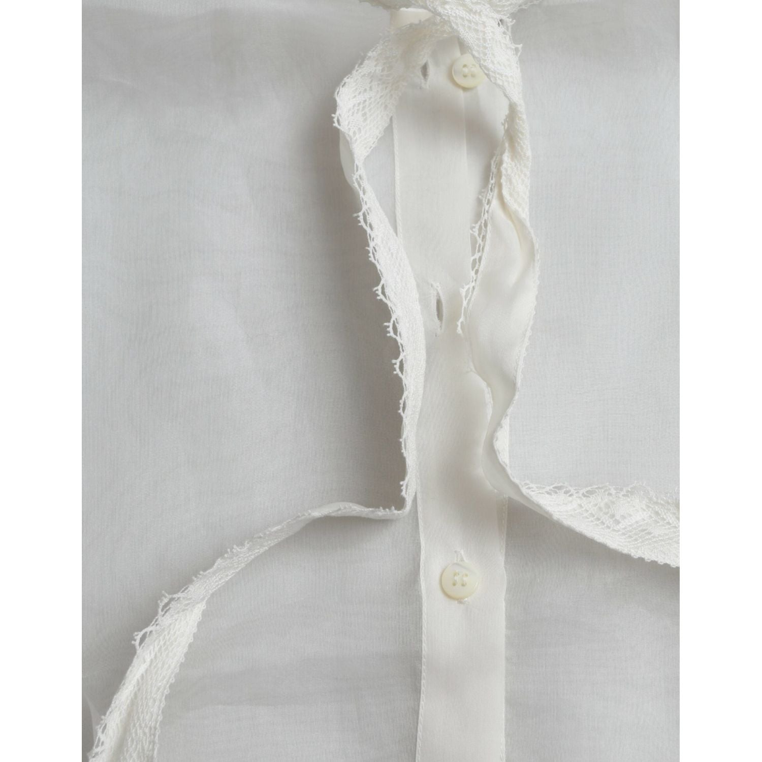 بلوزة دولتشي آند غابانا الأنيقة المصنوعة من مزيج الحرير بأكمام طويلة