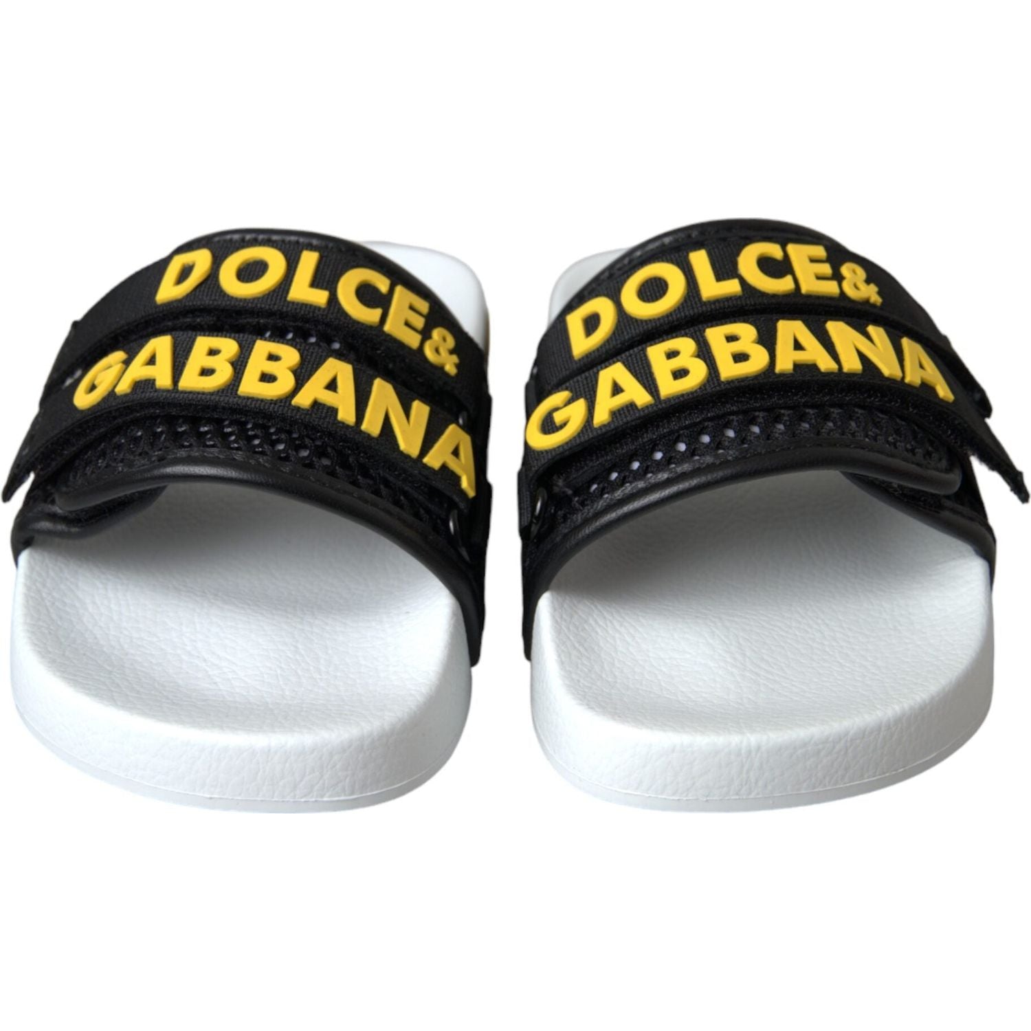 أحذية شاطئ مسطحة من دولتشي آند غابانا باللونين الأبيض والأسود بشعار