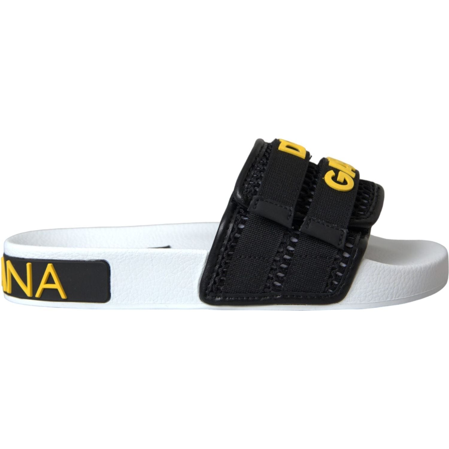 أحذية شاطئ مسطحة من دولتشي آند غابانا باللونين الأبيض والأسود بشعار