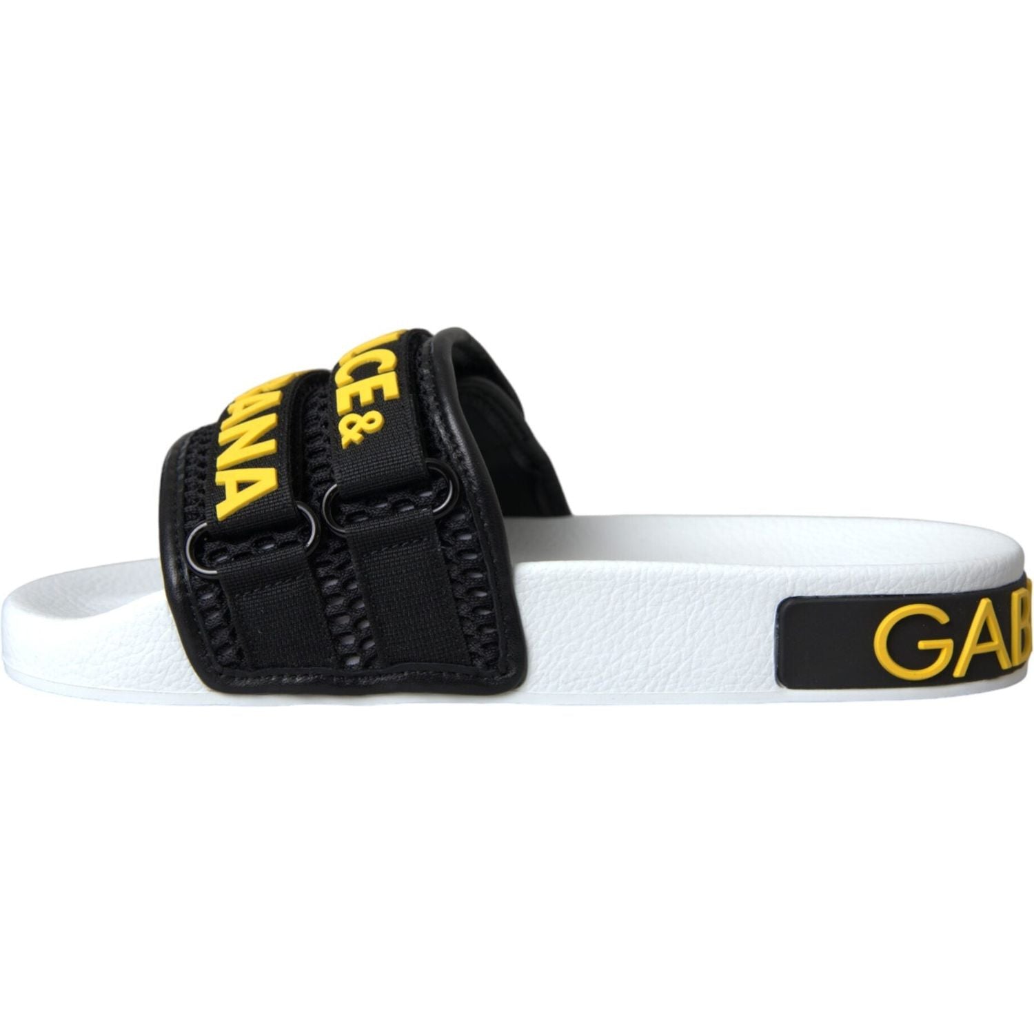 أحذية شاطئ مسطحة من دولتشي آند غابانا باللونين الأبيض والأسود بشعار