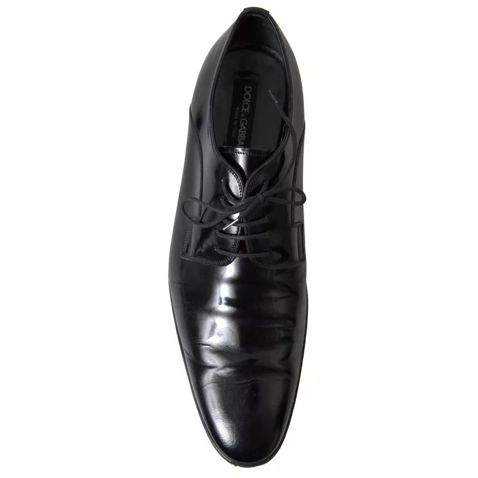 Dolce & Gabbana Black Polished Leather Formal Dress Shoes with logo detail, slight wear, made in Italy, leather outer sole.