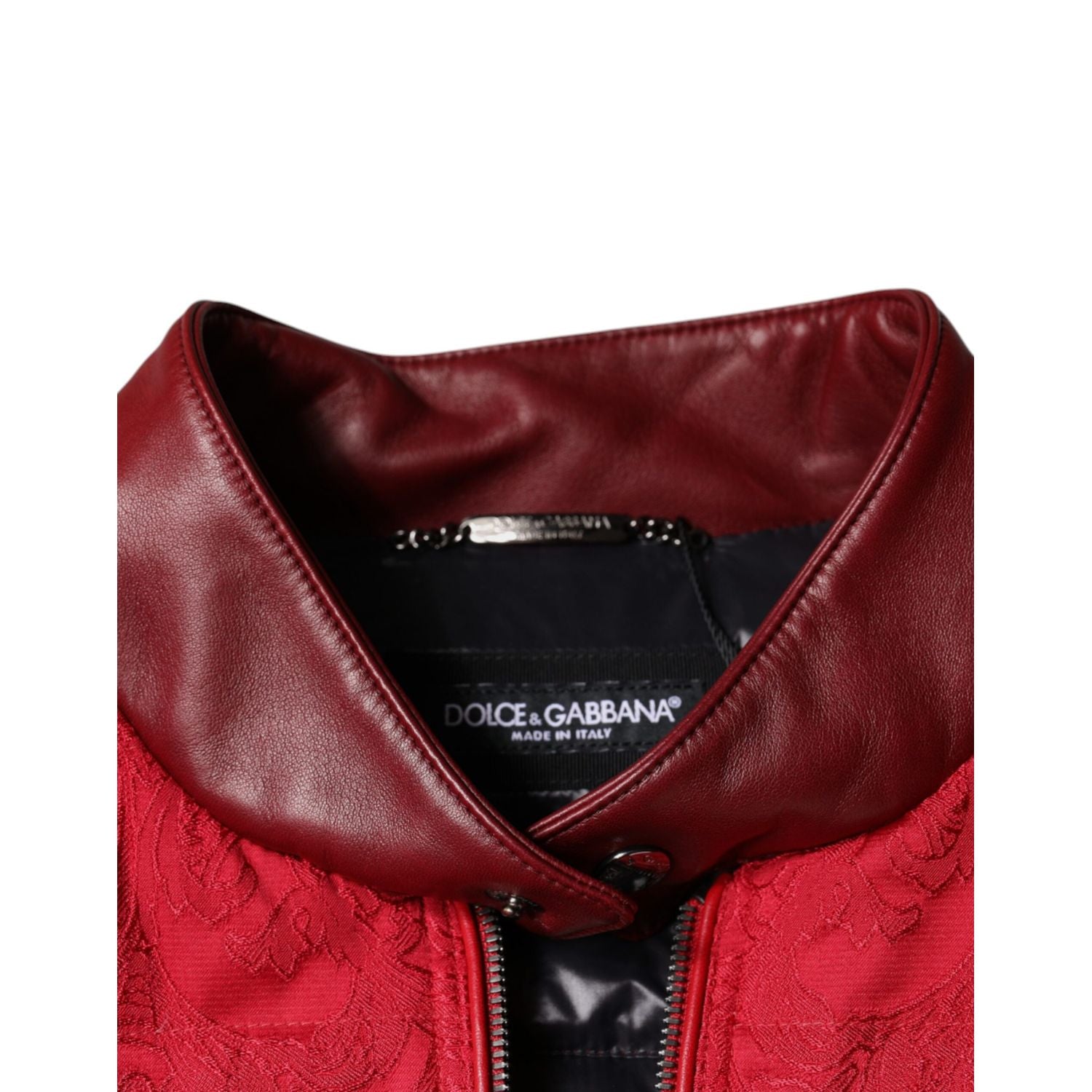 Front view with bag zipped and handles upright.