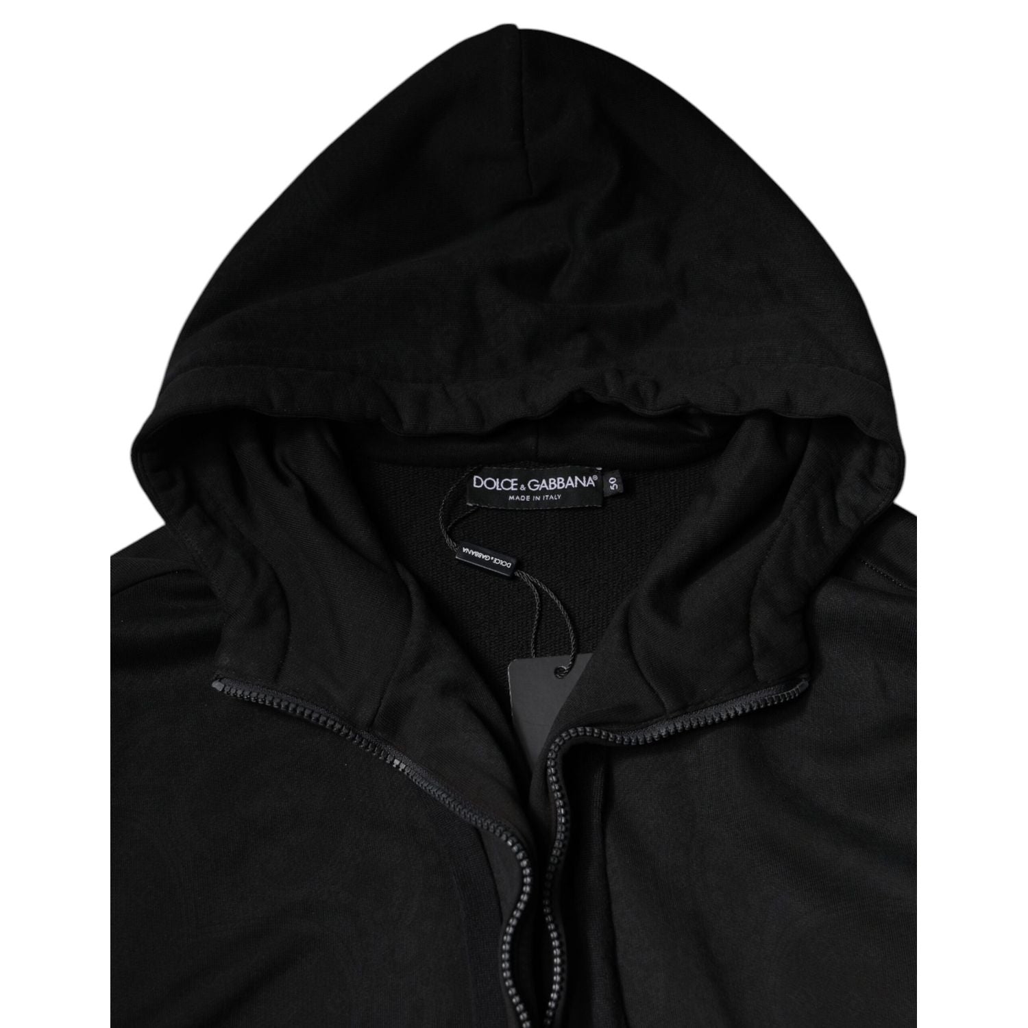 Front view with bag zipped and handles upright.