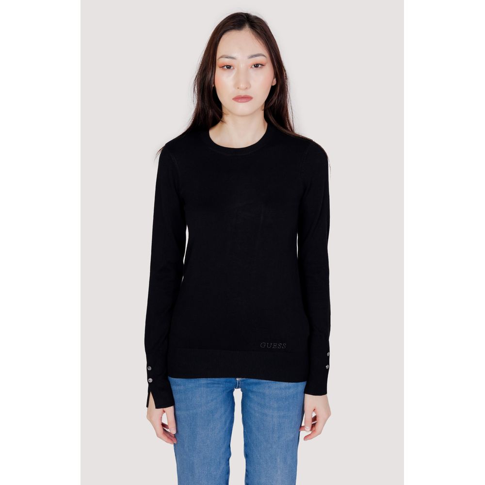 Woman wearing Guess Black Cotton Sweatshirt with decorative buttons and subtle logo embroidery.