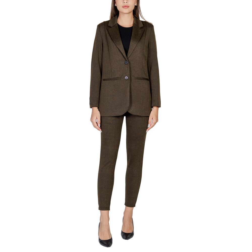 Woman wearing ICHI Green Polyester Blazer, model 20121605, with elegant two-button closure and classic lapel, perfect for modern look.