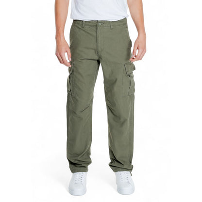 Man wearing Jack Jones Green Cotton Cargo Pants with side flap pockets and tapered fit.