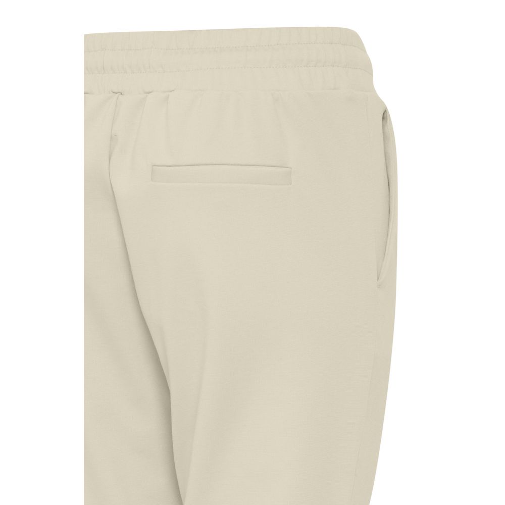ICHI Beige Polyester Pants featuring elastic waistband and clean design for a modern slim fit.