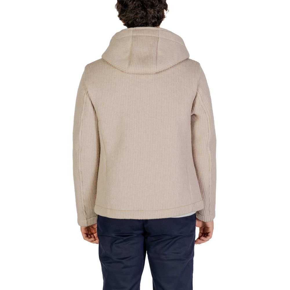 Front view with bag zipped and handles upright.