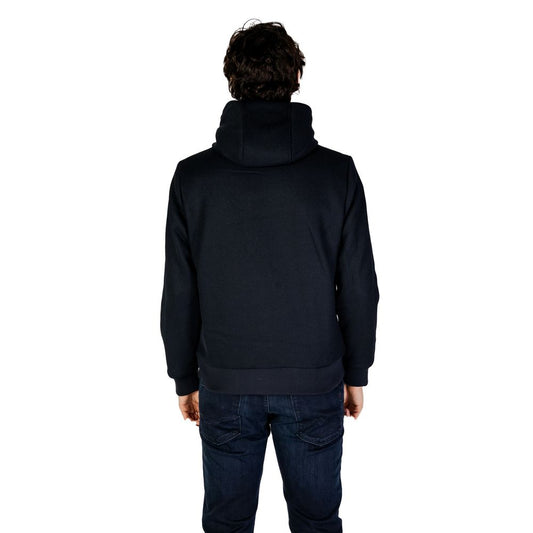 Back view of a man wearing Hydra Clothing Blue Polyester Jackets & Coat for men, perfect for fall and winter fashion.