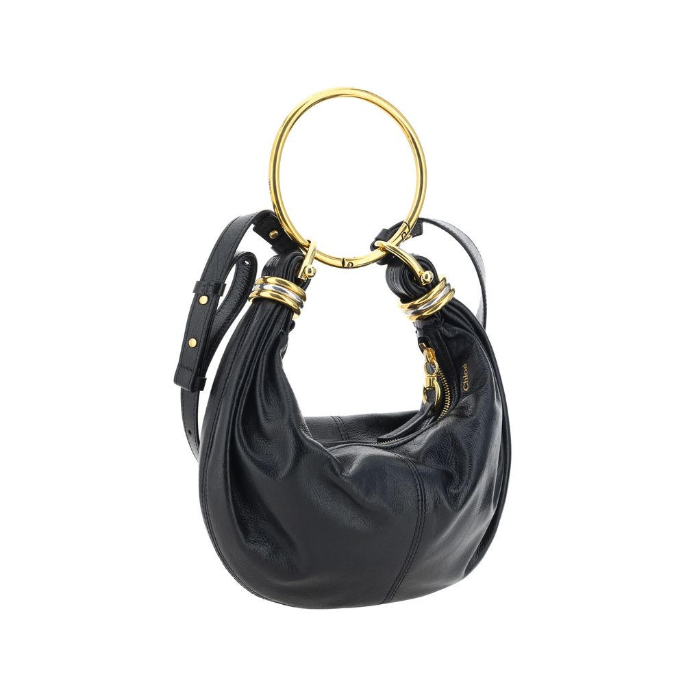 Front view with bag zipped and handles upright.