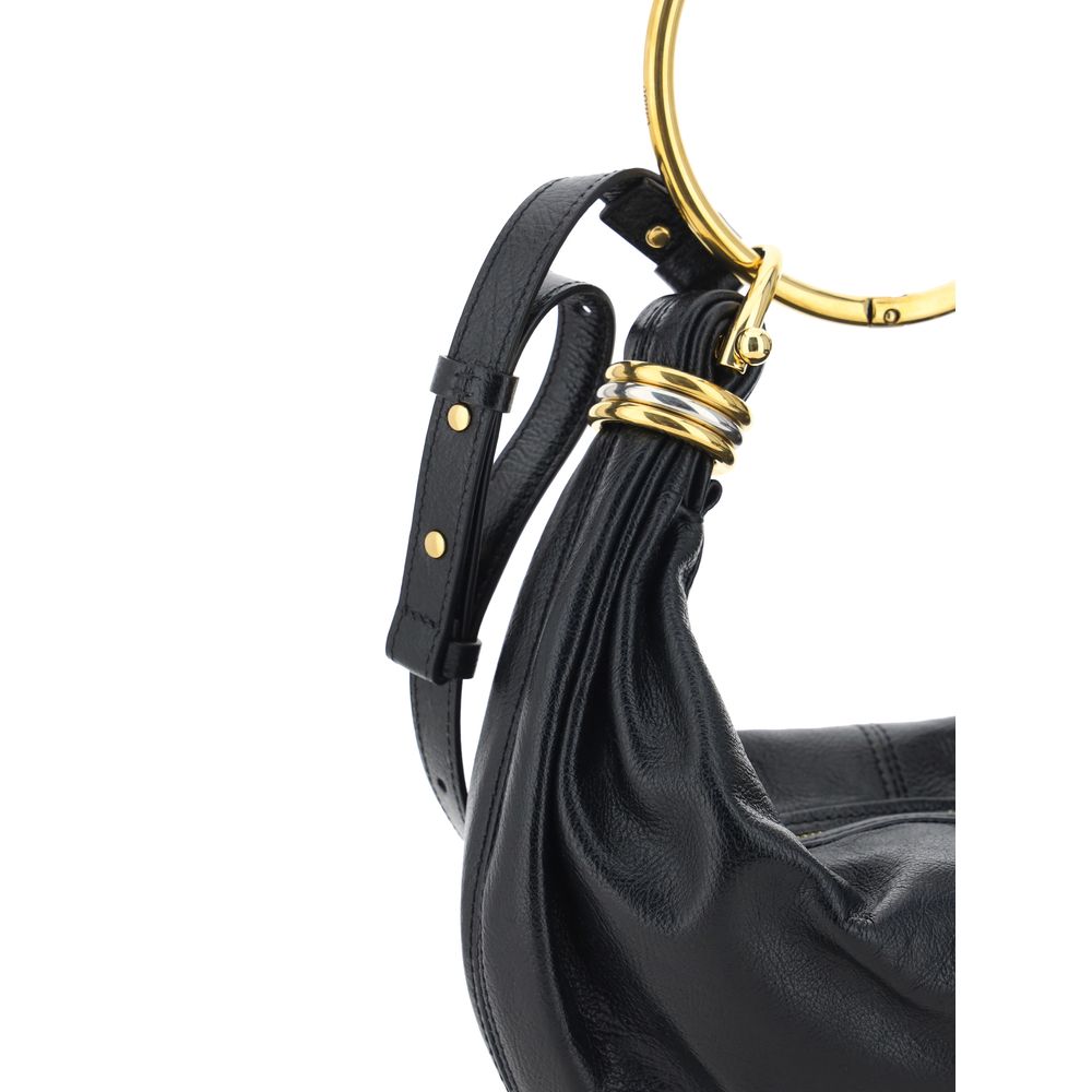 Front view with bag zipped and handles upright.