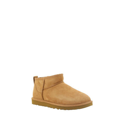 UGG Brown Goatskin Ankle Boots with shearling lining, knurled sole, round toe, and brand monogram for style and functionality.