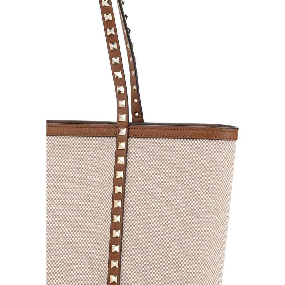 Front view with bag zipped and handles upright.