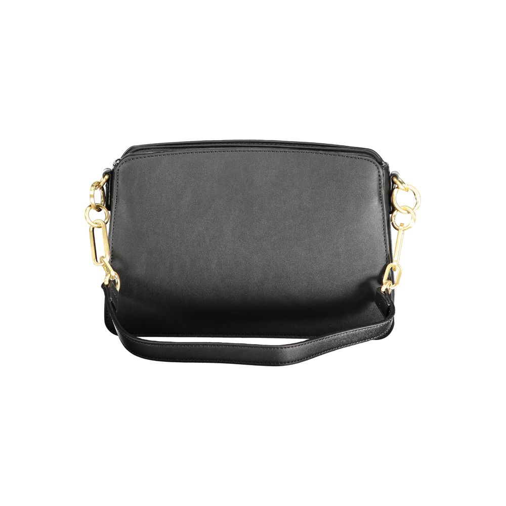 Front view with bag zipped and handles upright.
