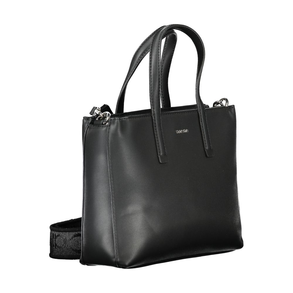 Calvin Klein Black Polyester Women Handbag with dual handles and adjustable shoulder strap, showcasing urban-chic elegance and functionality.