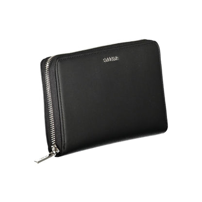 Calvin Klein Black Polyester Wallet with zip closure, RFID blocking, coin purse, and 3 compartments; made of 50% recycled polyester.