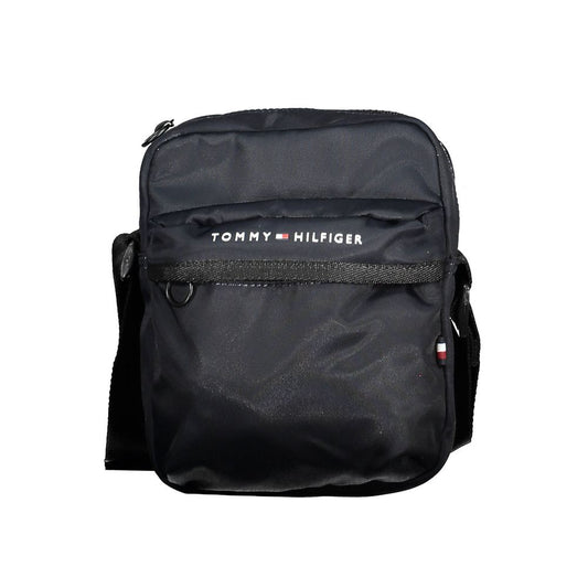 Tommy Hilfiger Blue Polyester Men Shoulder Bag with logo, external pocket, and zip closure. Eco-friendly and stylish accessory for men.