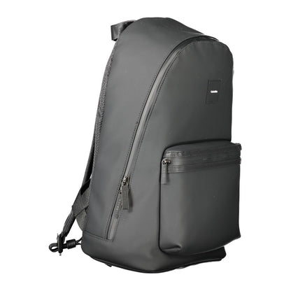Calvin Klein Black Polyester Men Backpack with adjustable straps and front pocket, offering modern design and ample storage.