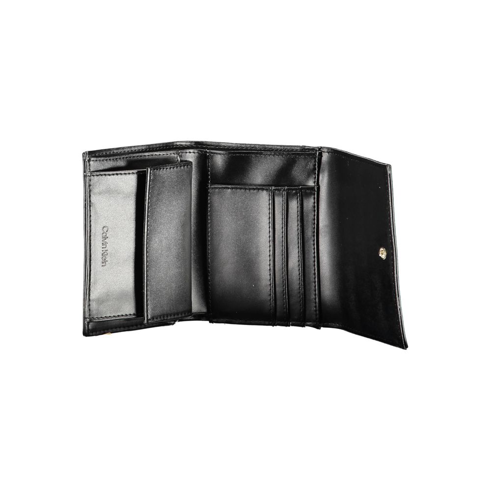 Calvin Klein Black Polyester Women Wallet with sleek design and automatic closure, showcasing interior compartments.