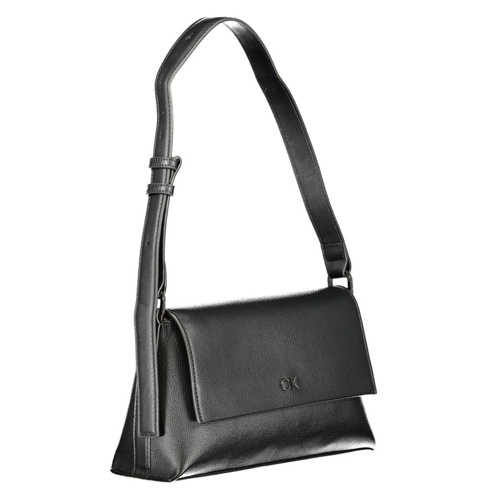 Calvin Klein Black Polyester Handbag with adjustable shoulder handle, internal pocket, snap closure, and logo detailing.