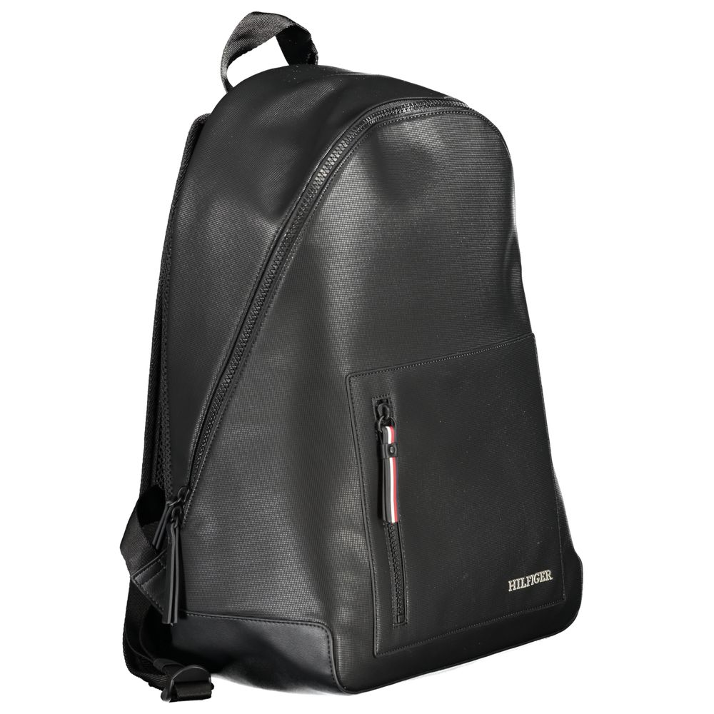 Tommy Hilfiger Black Polyester Backpack featuring adjustable straps, external pocket, internal laptop compartment, and contrasting details.
