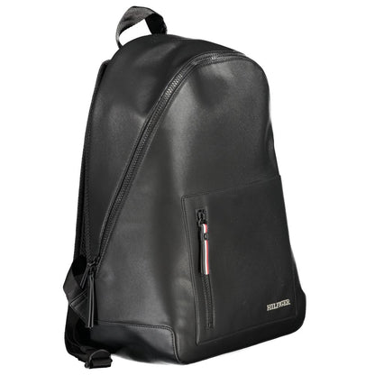Tommy Hilfiger Black Polyester Backpack featuring adjustable straps, external pocket, internal laptop compartment, and contrasting details.