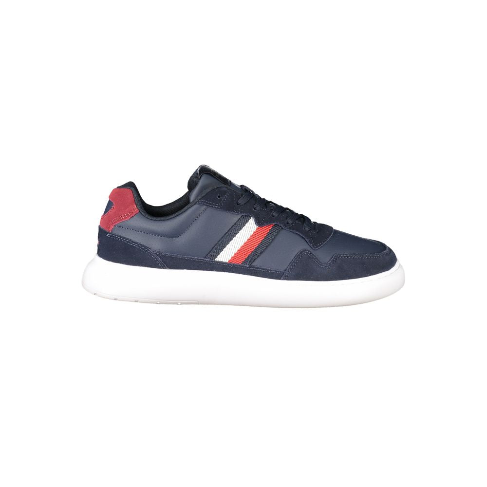 Tommy Hilfiger Blue Leather Men Sneaker with logo and contrasting details, ideal for modern trendsetters seeking style and comfort.