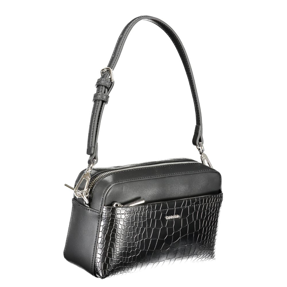 Calvin Klein Black Polyester Handbag with adjustable strap, external pocket, contrast details, and logo visible.