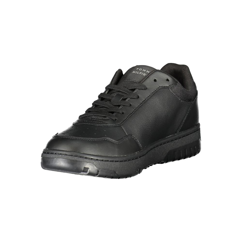 Tommy Hilfiger Black Leather Men Sneaker featuring sleek design and iconic logo for urban chic style.