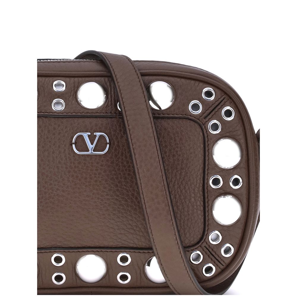 Front view with bag zipped and handles upright.