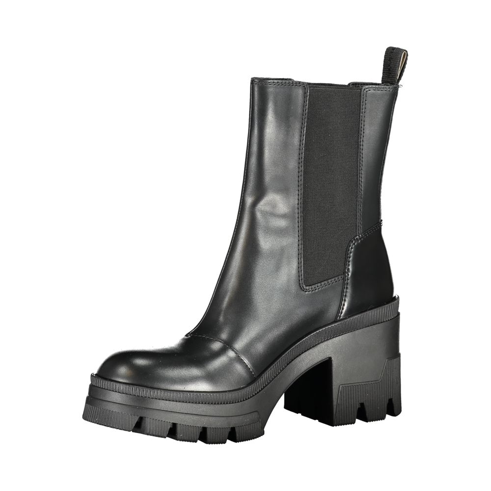 Calvin Klein Black Leather Women Boot with chic 8 cm heel and iconic logo, blending sophistication with signature elegance.