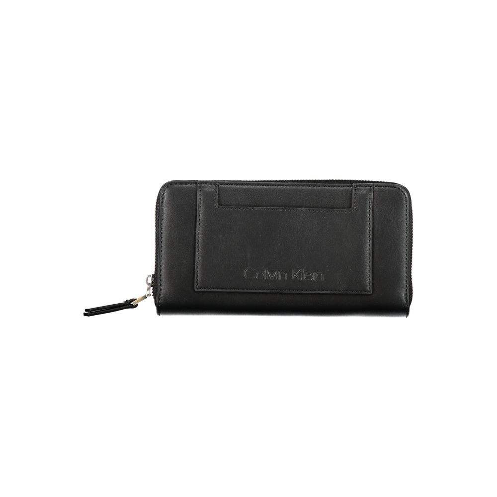 Calvin Klein Black Polyester Wallet with zipper closure, multiple compartments, coin purse, and logo, made from 50% recycled materials.