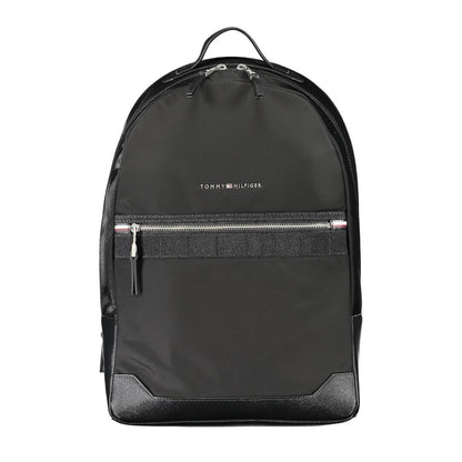 Tommy Hilfiger Black Polyester Backpack with front external pocket, handle, adjustable straps, and zip closure, made of 50% recycled polyester.