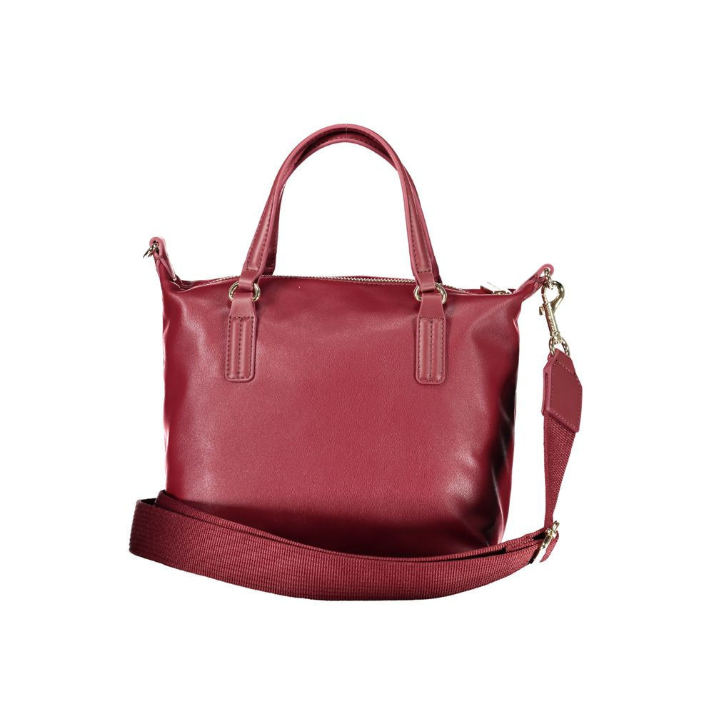 Tommy Hilfiger Red Polyester Handbag with adjustable strap, dual handles, zip closure, and internal pocket.