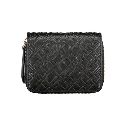 Tommy Hilfiger Black Polyethylene Wallet with coin purse, card spaces, and zip closure, featuring contrasting details and logo.