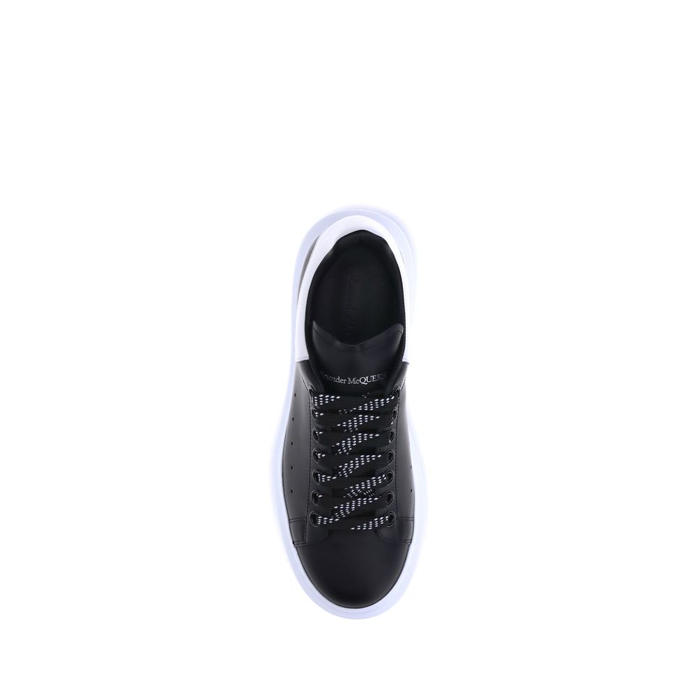 Alexander McQueen Black Calf Leather Bos Taurus Platform Sneakers, top view, featuring lace-up closure and platform sole.