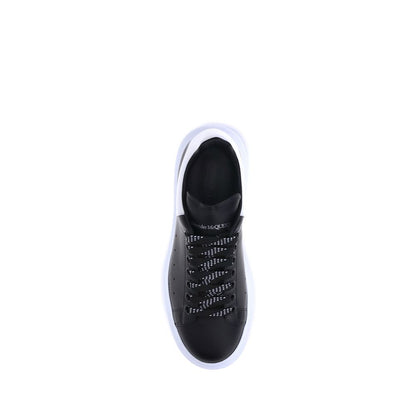 Alexander McQueen Black Calf Leather Bos Taurus Platform Sneakers, top view, featuring lace-up closure and platform sole.