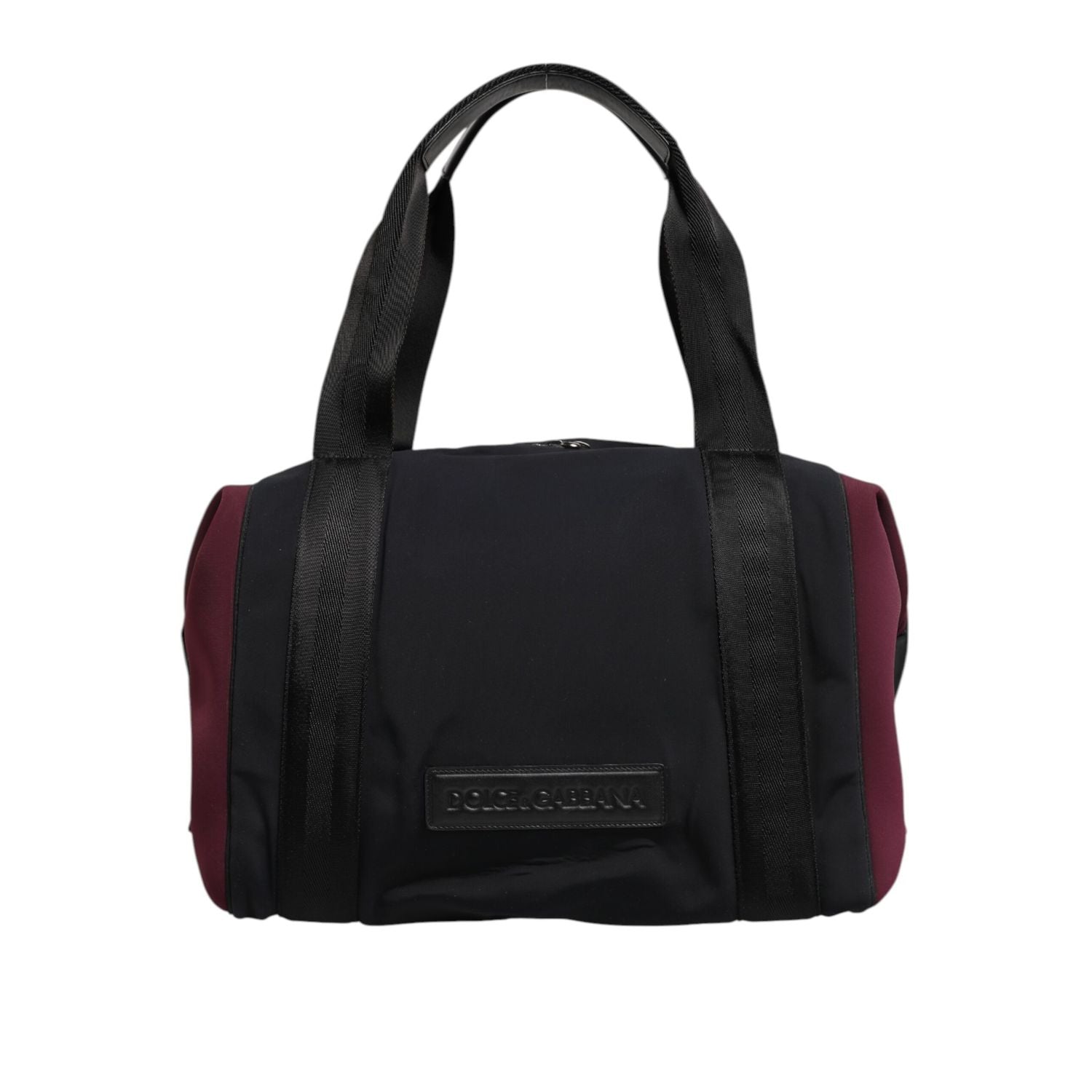 Front view with bag zipped and handles upright.